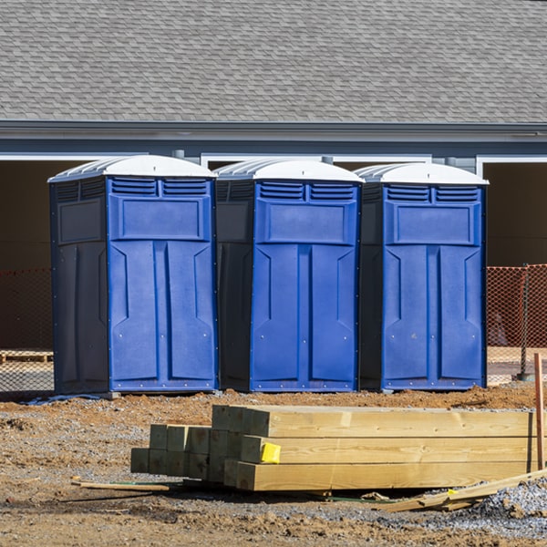 what is the cost difference between standard and deluxe portable restroom rentals in Arden